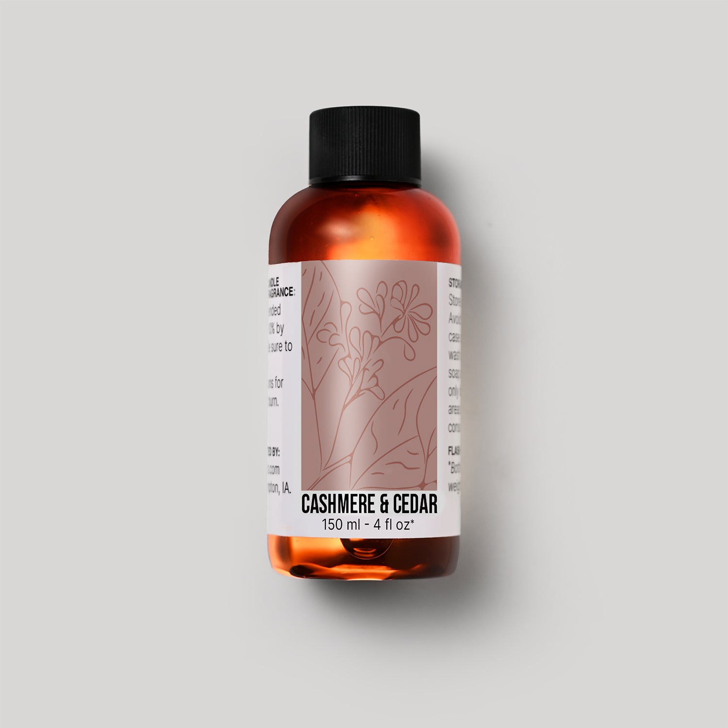 150 ml bottle of Cashmere & Cedar fragrance oil with a label on a white background