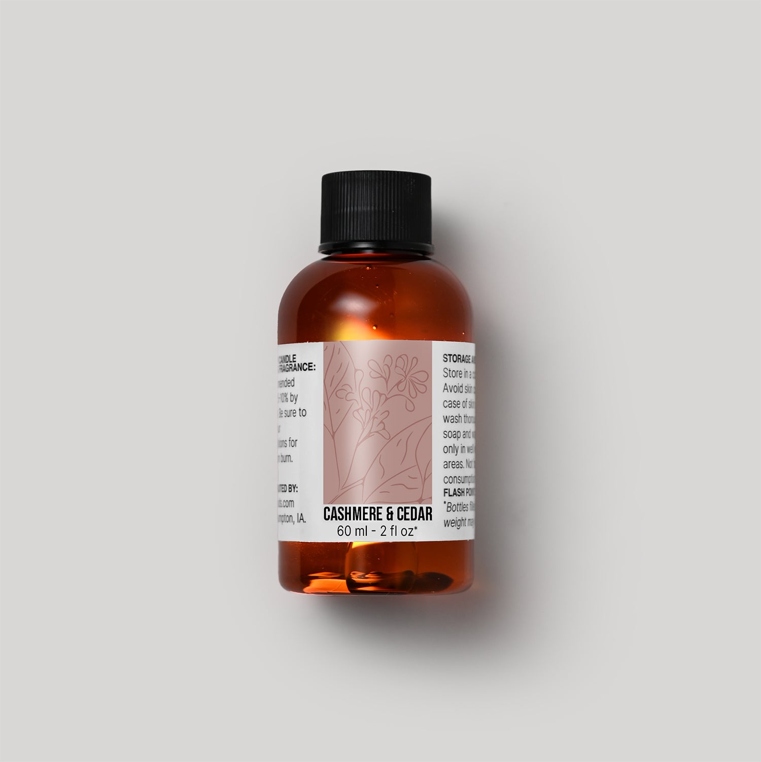 60 ml bottle of Cashmere & Cedar fragrance oil with a label on a white background