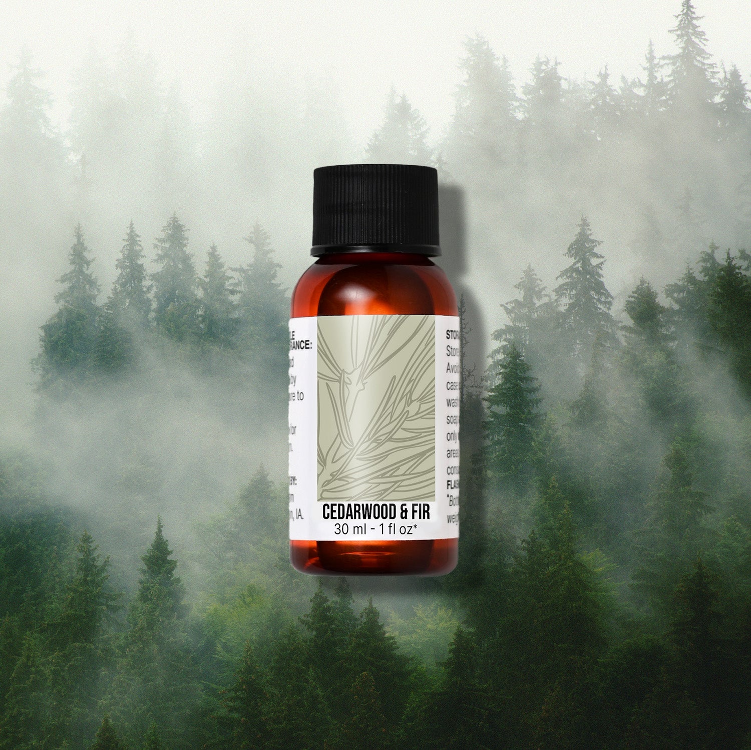 Bottle of Cedarwood & Fir fragrance oil with a forest background