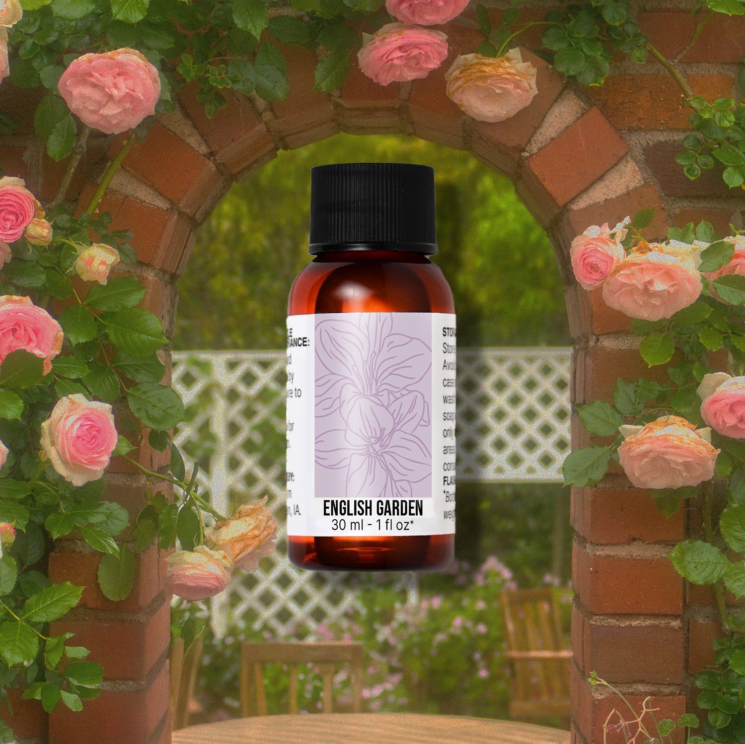 Bottle of 'English Garden' fragrance oil with a garden background