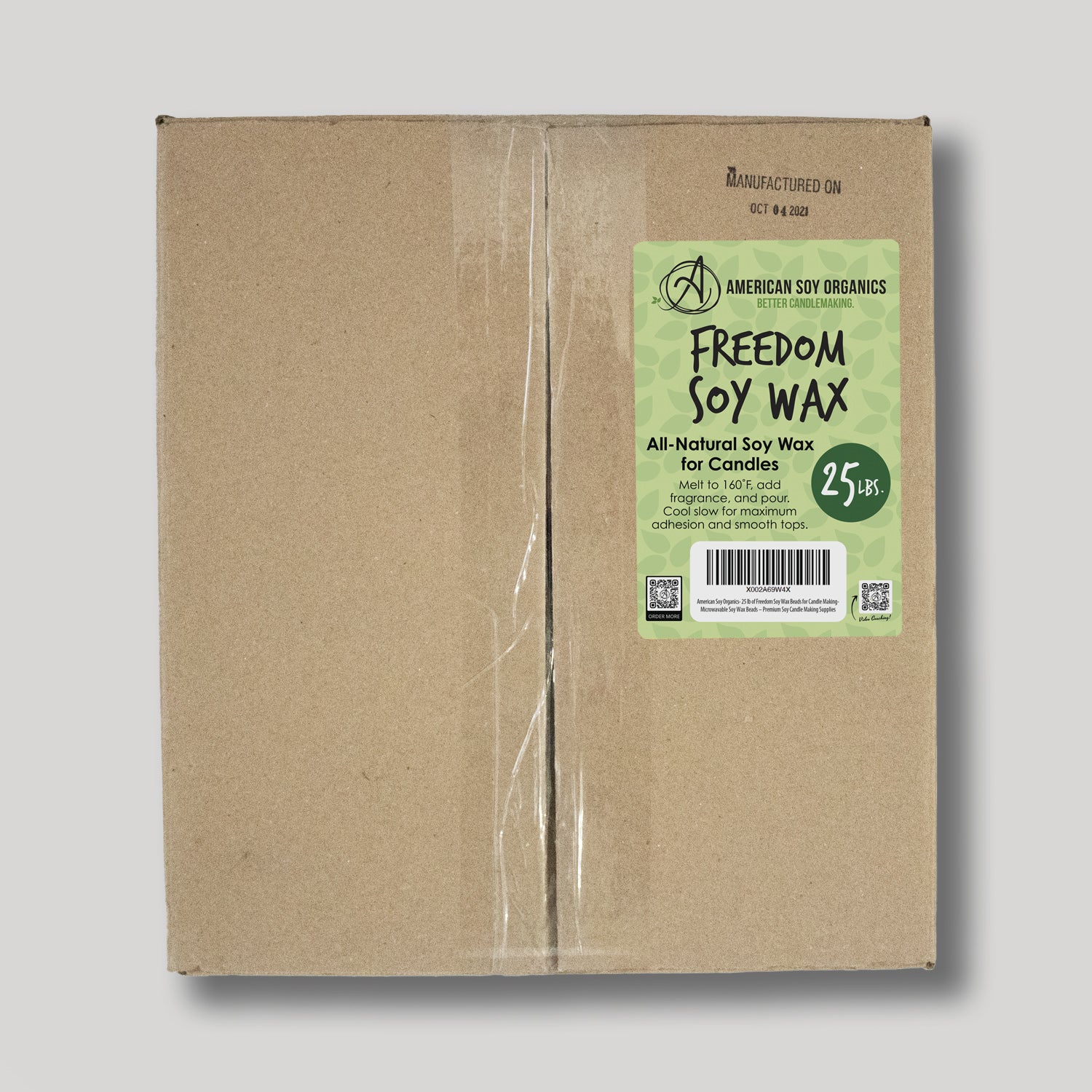 Cardboard box with a green label for 25 lbs. of Freedom Soy Wax on a white background