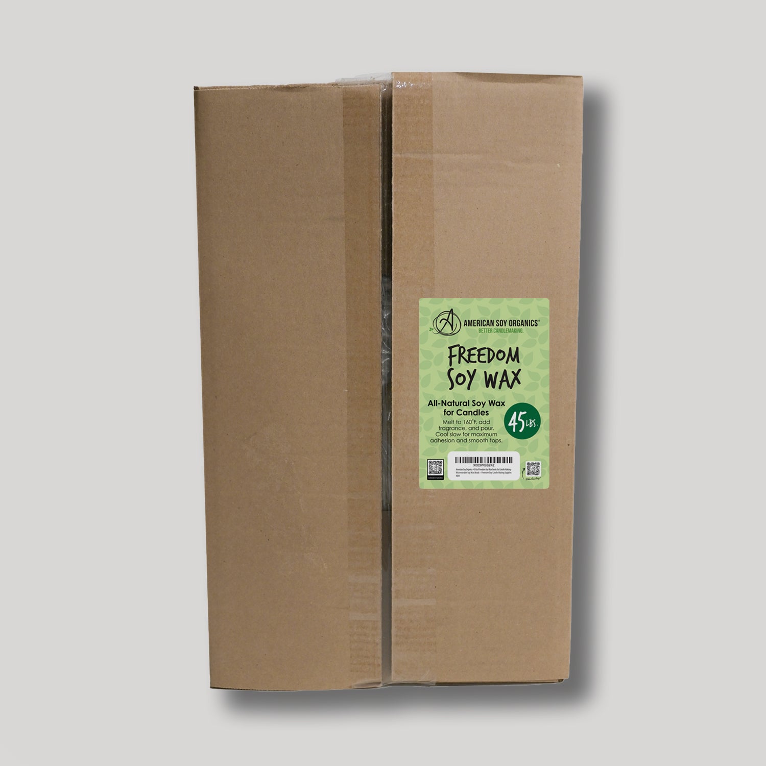 Cardboard box with a green label for 45 lbs. of Freedom Soy Wax on a white background