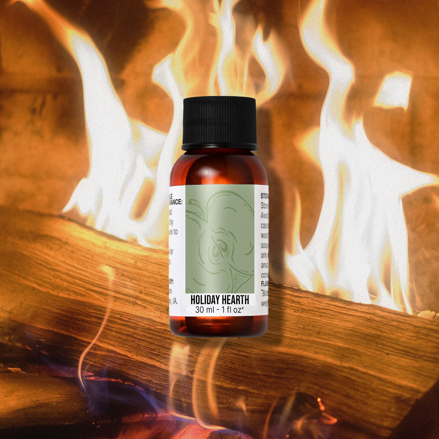 Bottle of 'Holiday Hearth' fragrance oil in front of a fireplace with flames.