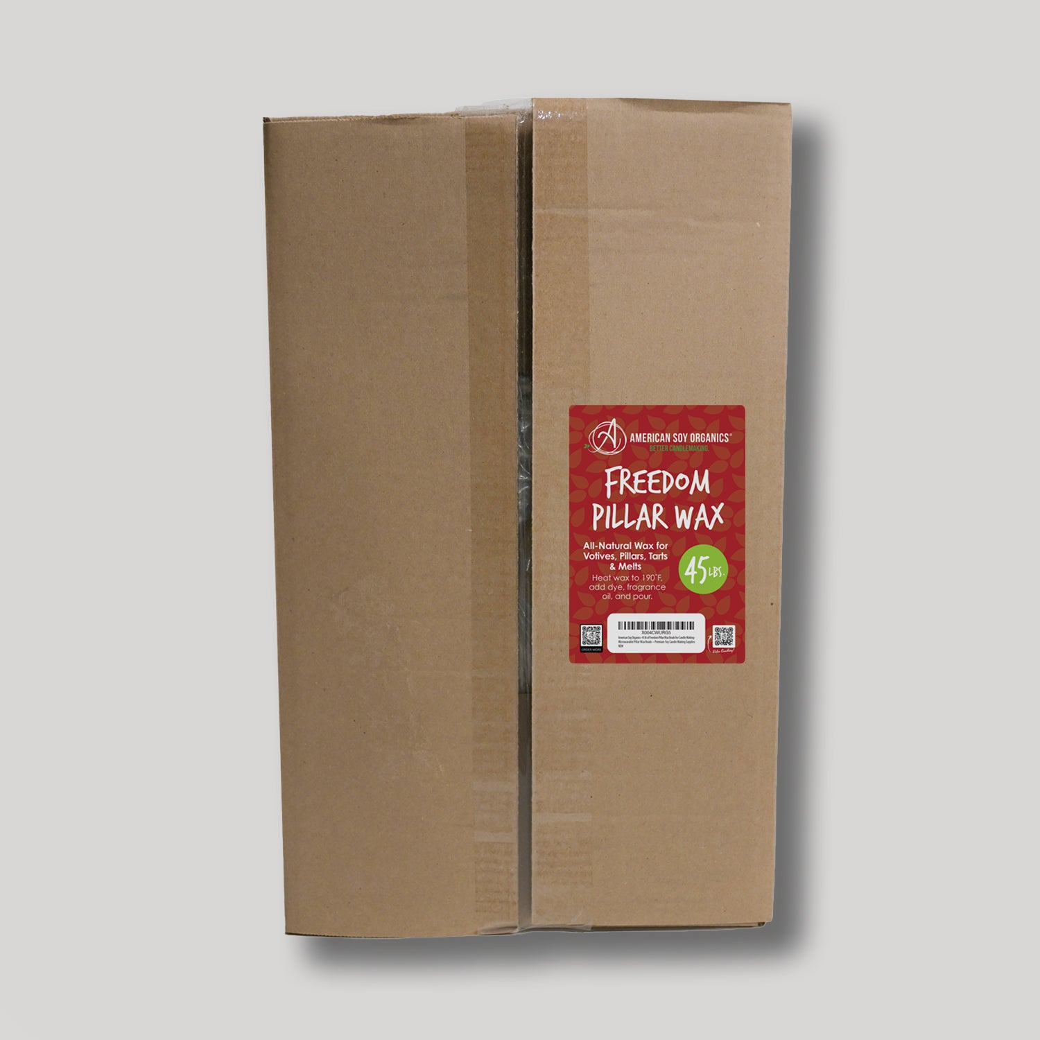 Cardboard box with a red label for 45 lbs. of Freedom Pillar Wax on a white background