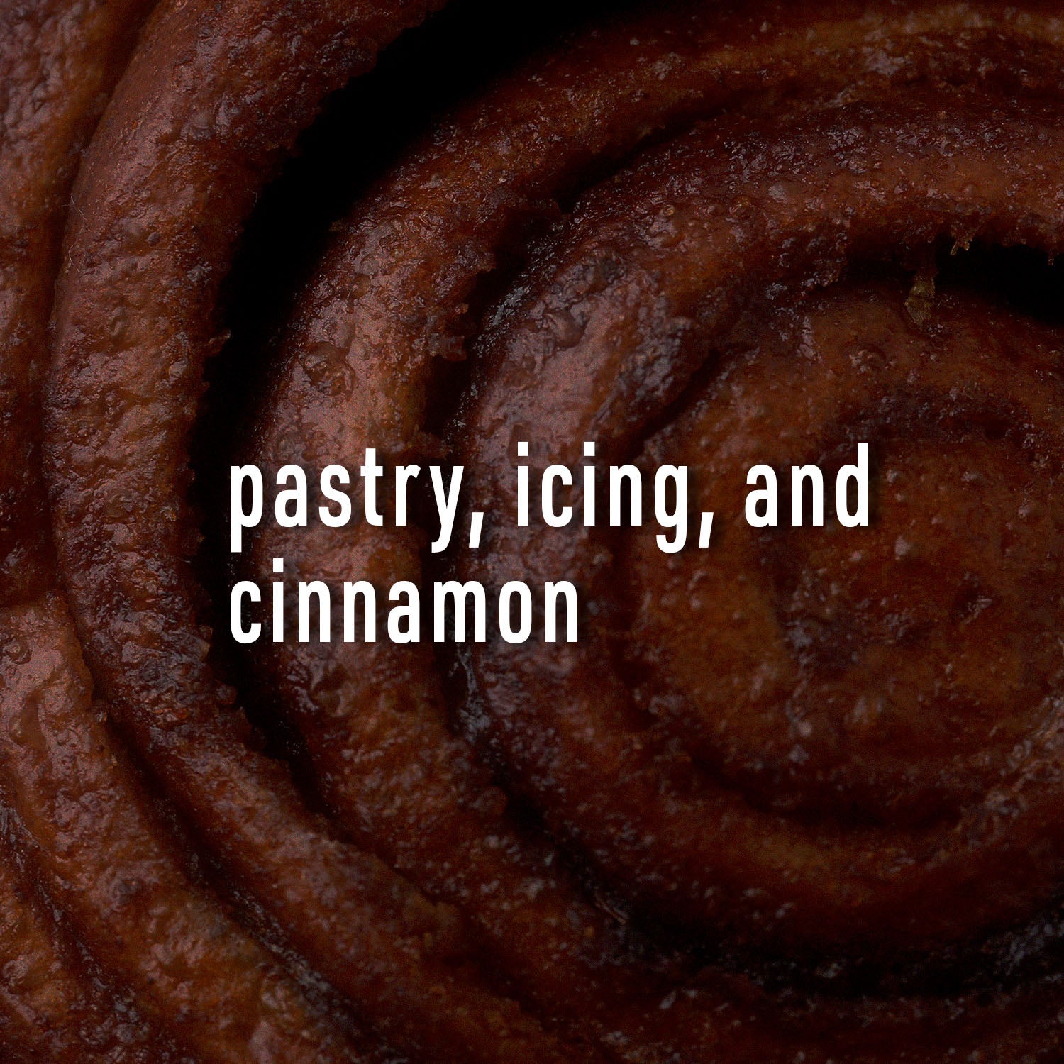 Close-up of a cinnamon roll with text overlay 'pastry, icing, and cinnamon'.
