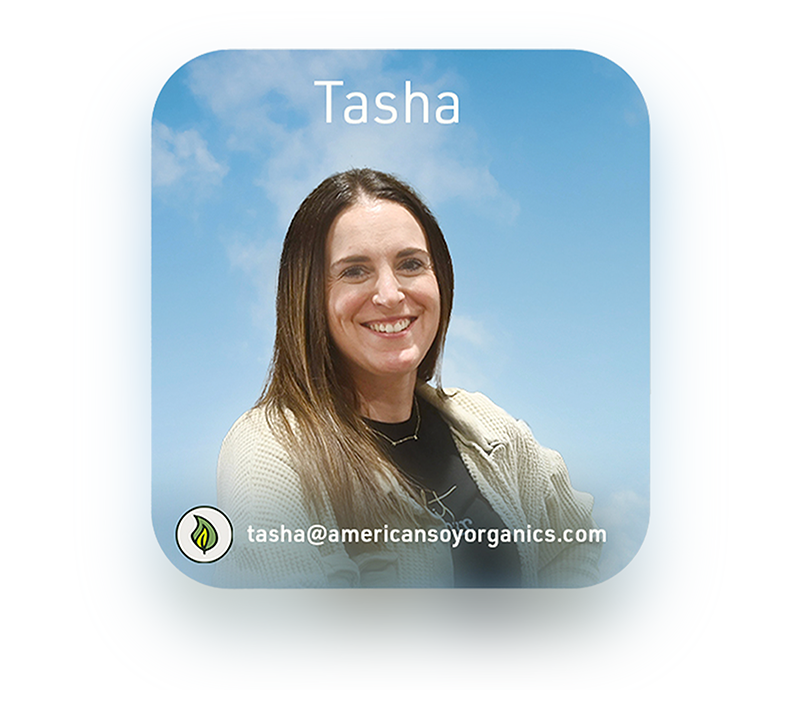 Square profile picture of a woman named Tasha with a blue sky background