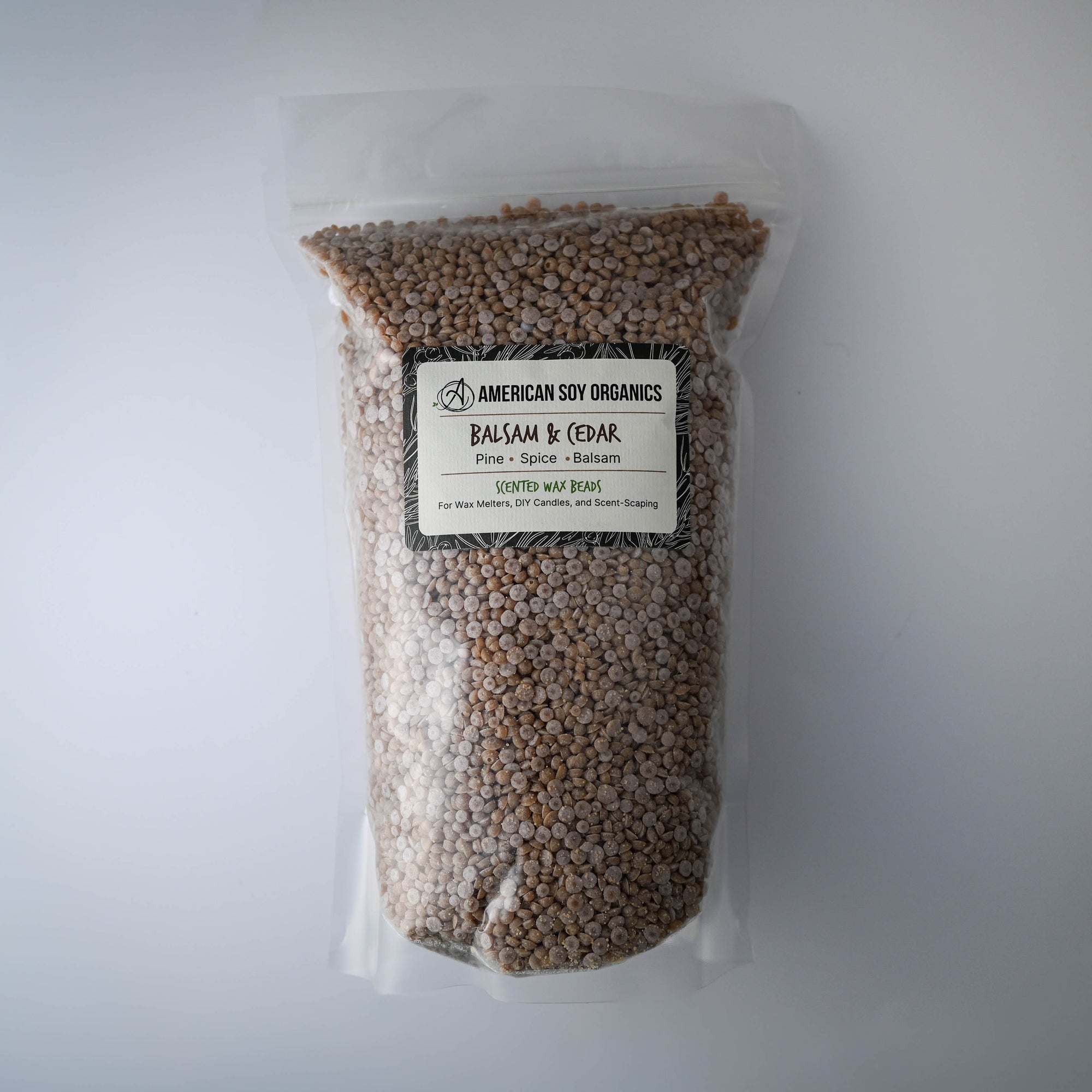 Bag of Balsam & Cedar American Soy Organics scented wax beads on a white background