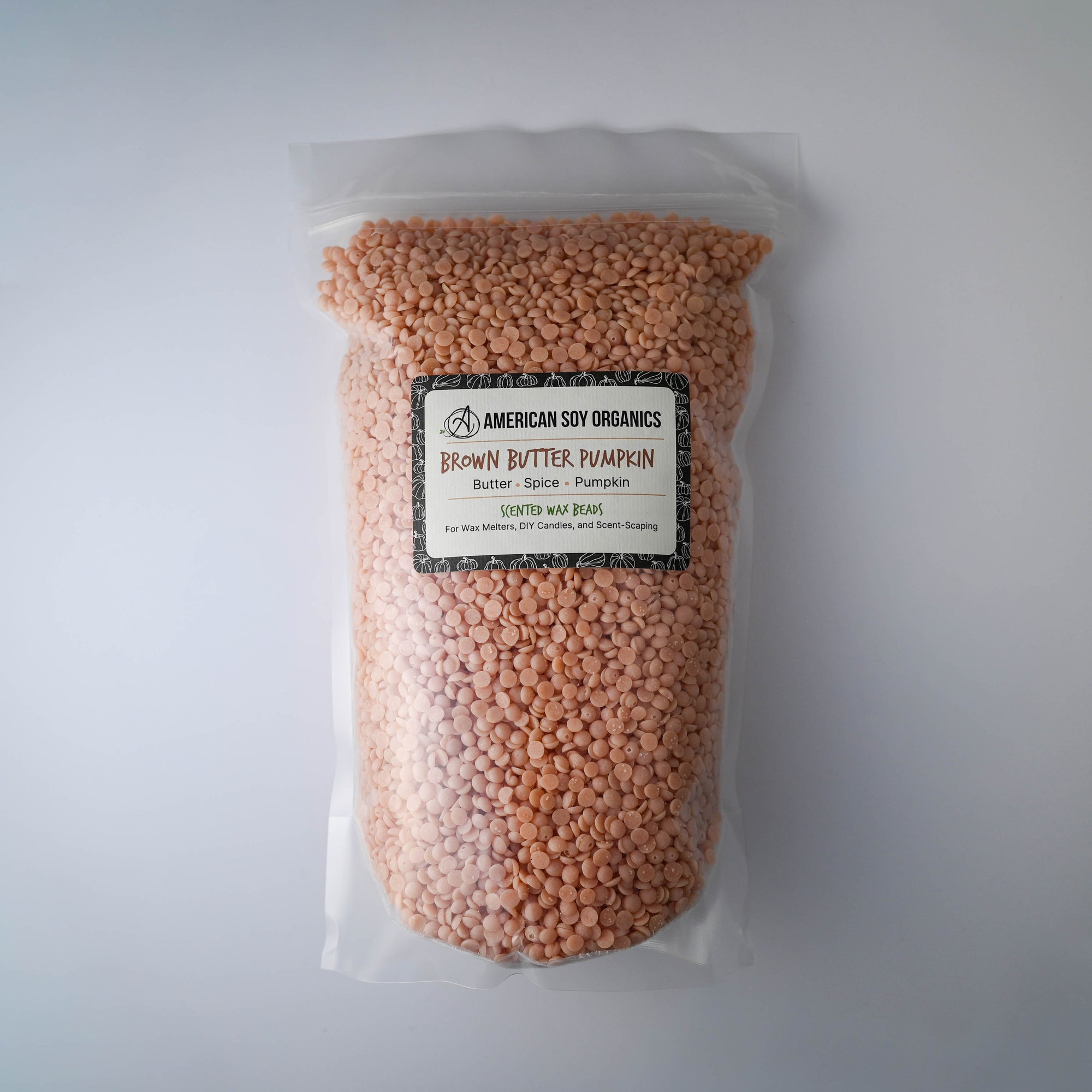 Bag of Brown Butter Pumpkin American Soy Organics scented wax beads on a white background
