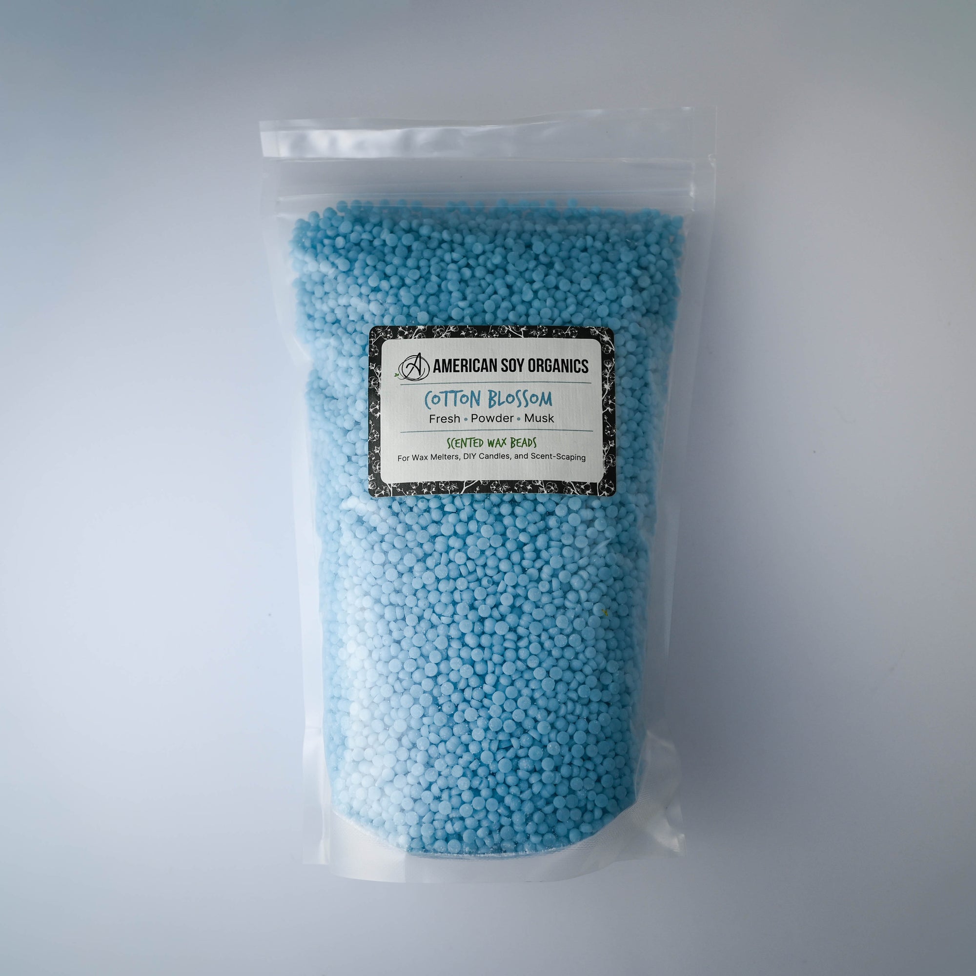 Bag of Cotton Blossom American Soy Organics scented wax beads on a white background