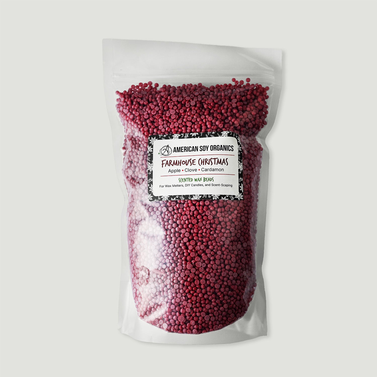 Bag of red wax beads with a label on a white background