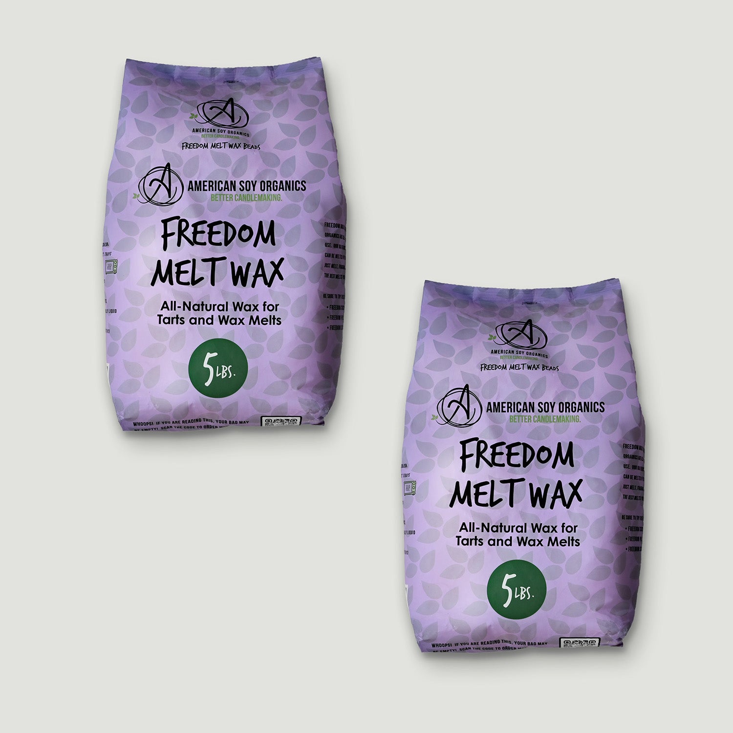 Two packages of American Soy Organics Freedom Melt Wax on a light gray background