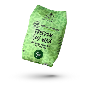 Green package of American Soy Organics Freedom Soy Wax on a plain background