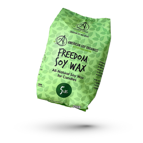 Green package of American Soy Organics Freedom Soy Wax on a plain background