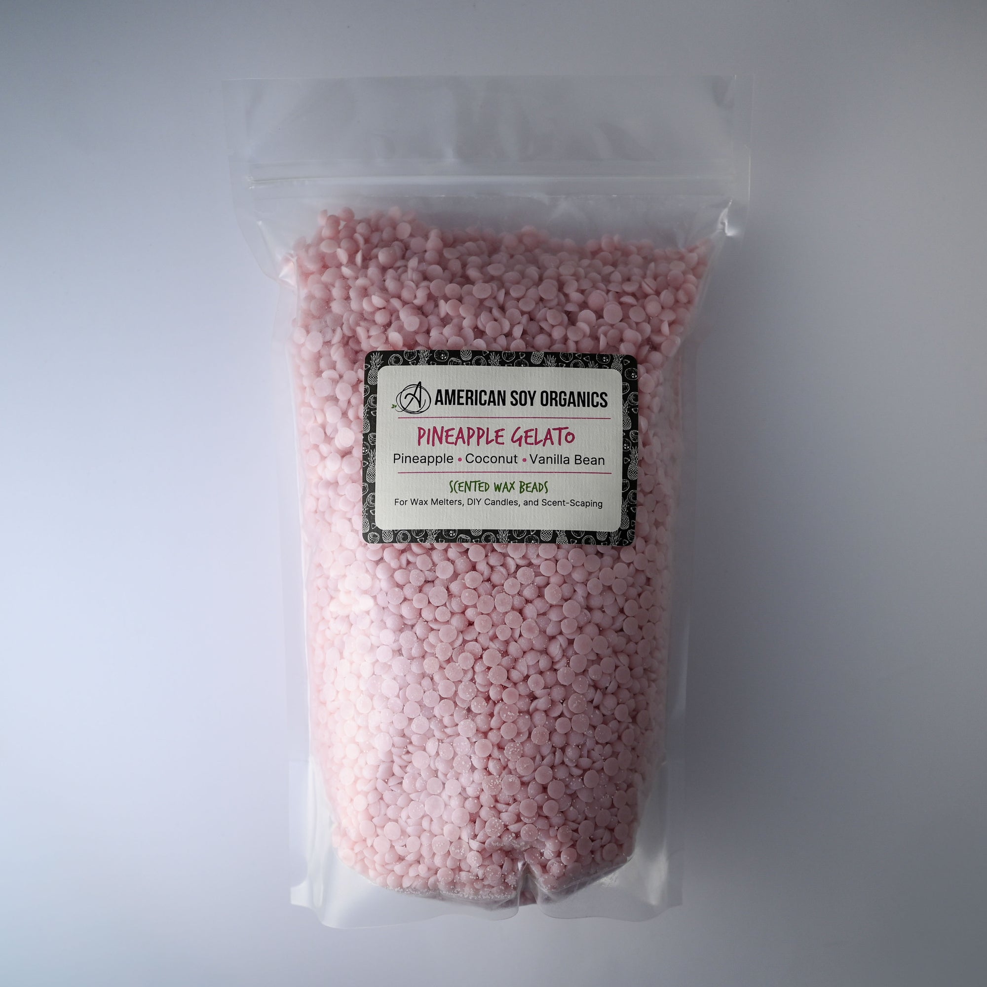 Bag of pink wax beads with a pineapple gelato label on a white background