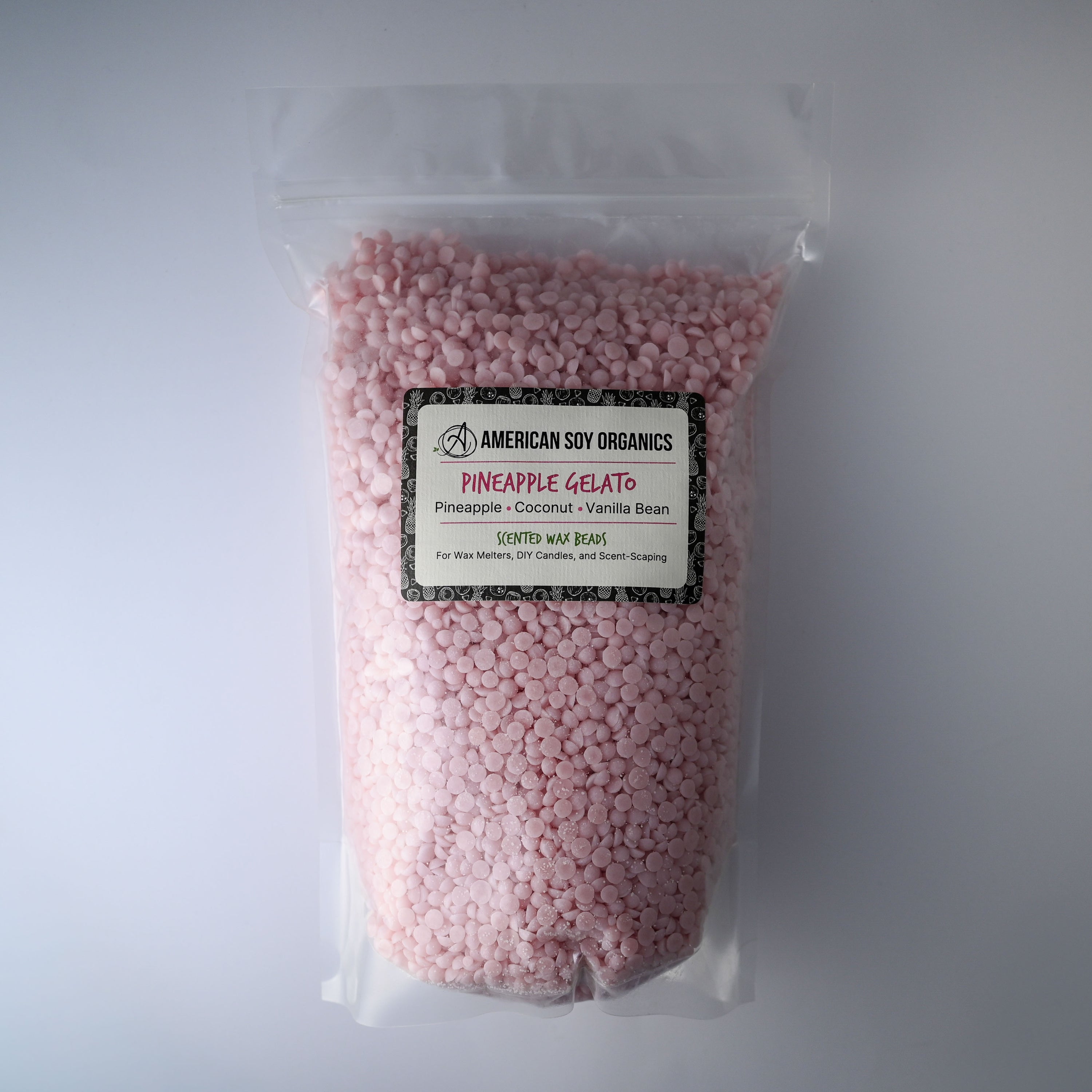 Bag of pink wax beads with a pineapple gelato label on a white background