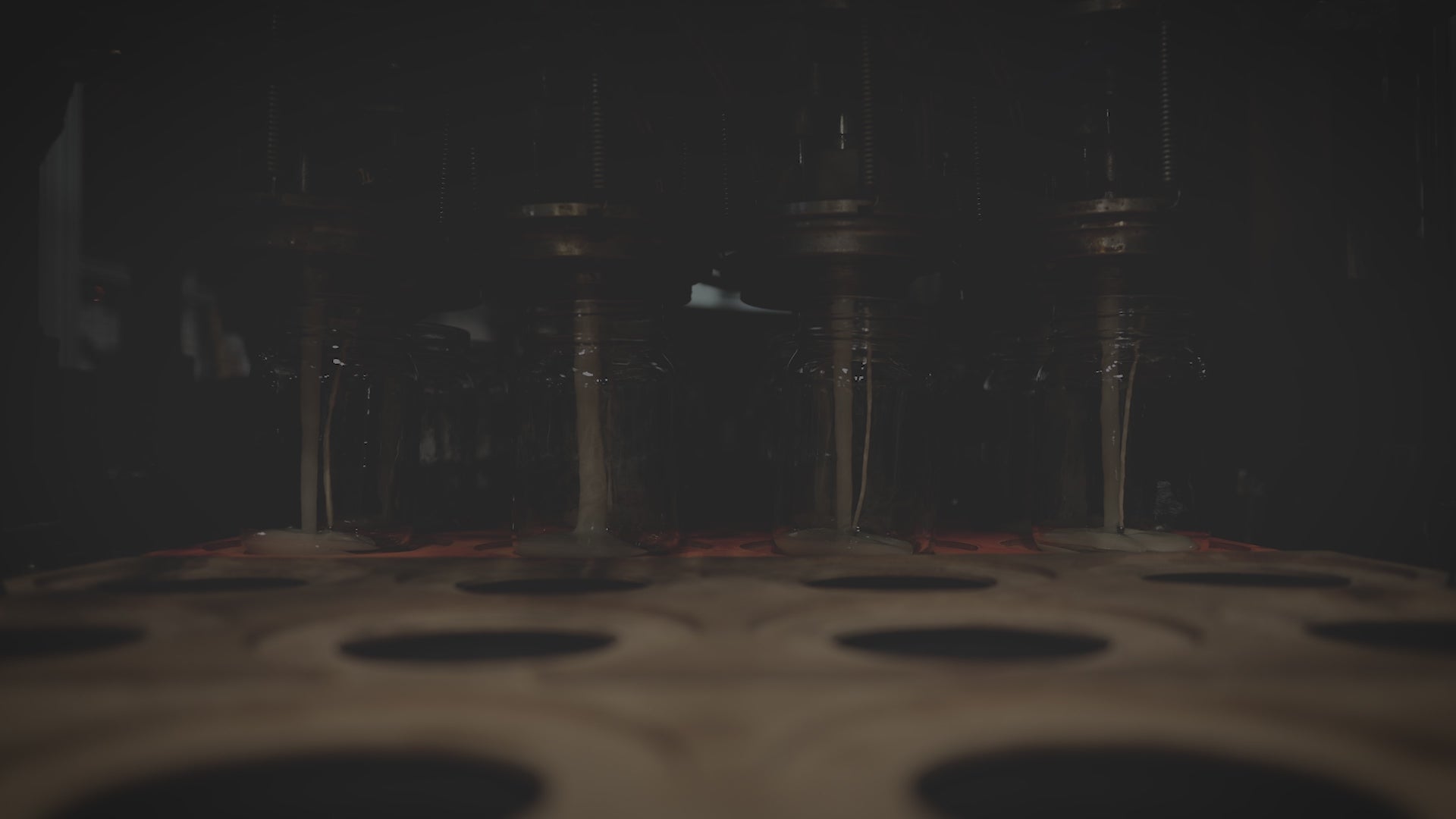 A collage of shots from a candle factory. 