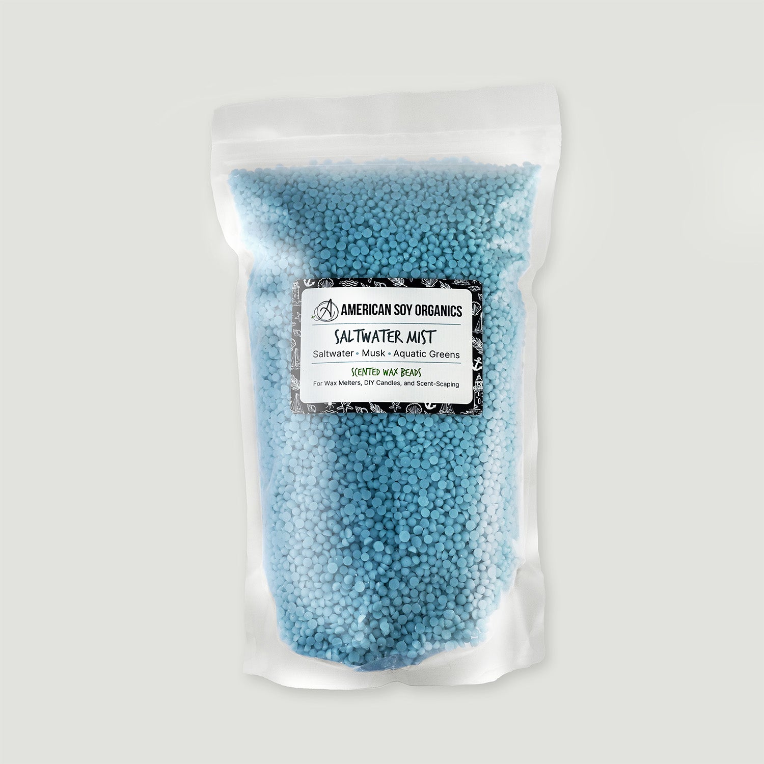 Bag of blue wax beads with a label on a white background