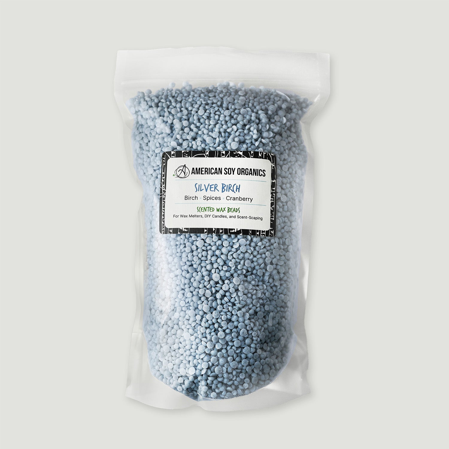 Bag of blue wax beads with an American Soy Organics label on a white background