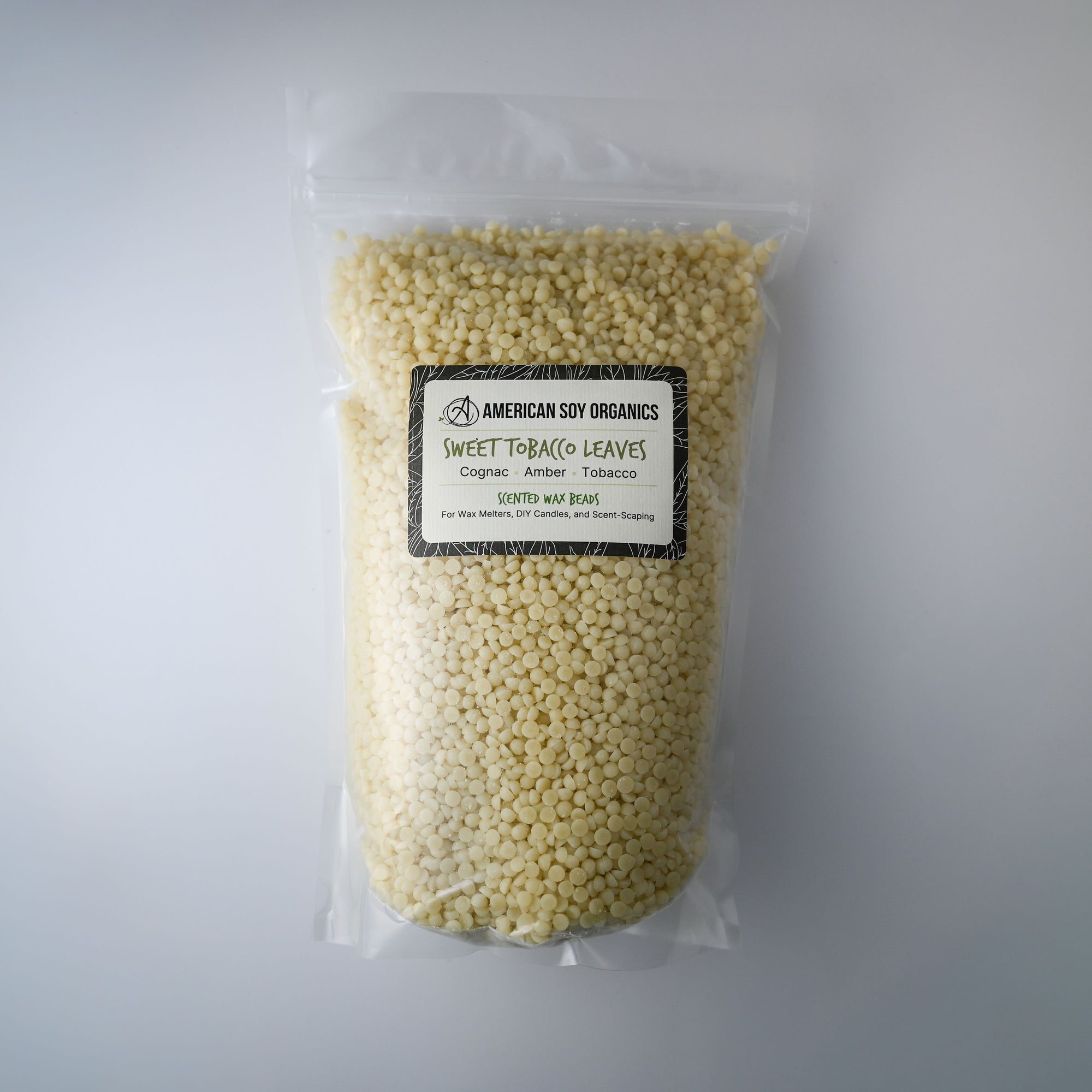 Bag of Sweet Tobacco Leaves American Soy Organics scented wax beads on a white background